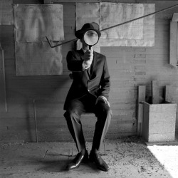 blackpicture:  Rodney Smith Collin with magnifying glass. Alberta.