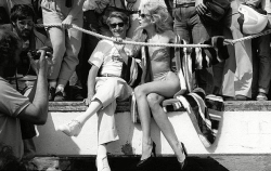 candypriceless:  Helmut Newton with Jerry Hall at the Cannes