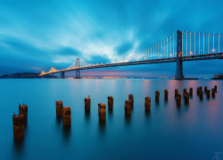 cityscapes:  Sunrise at the Bay Bridge, San Francisco by TahaElraaid