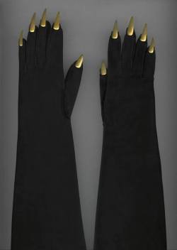 Elsa Schiaparelli “Long suede gloves with gold metal talons”
