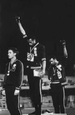 Gold medalist Tommie Smith (center) and bronze medalist John