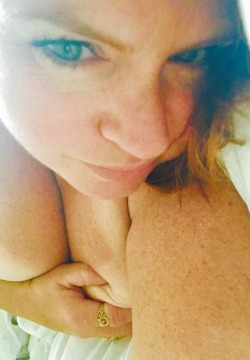 prettylilredhead:  Feeling lazy….Not out of bed yet on this