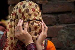 ‘Muslim Woman in New Delhi,India’ http://m.flickr.com/lightbox.gne?id=9575562366