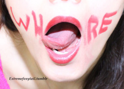 extremefoxytail:  A close-up of this whore’s mouth.  More