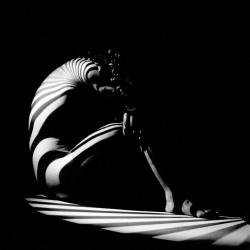 lightnessandbeauty:  Werner Bischof - Zebra woman - 1942