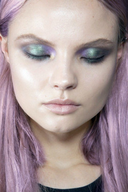 Such a beautiful face loving the purple hair and the eye shadow