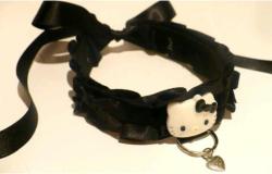 cloud9rockbottom:  Hello kitty black velvet bow collar. Tug proof.