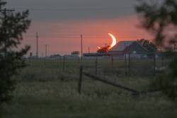 yourtake:A rare sight: “A partial annular eclipse shot at sunset