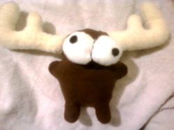 My hand stitched mini moose! I even put a squeaker in his belly