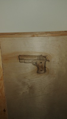 Got Bored and Drew A Gun On Wood at Uncles Rental Duplex We Are