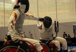 modernfencing:[ID: two wheelchair foilists in a bout. The fencer