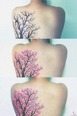 This is a beautiful tattoo.  I love that she blogged all three