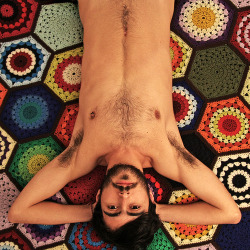 scruffster:  What a great rug! Also the lithe, furry young man!