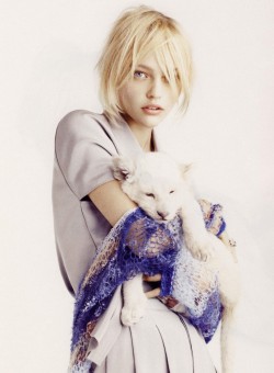 Sasha Pivovarova holding a Rodarte sweater in Vogue Paris by