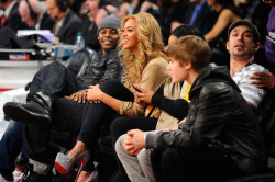 Beyonce at the All-Star game in her glittered triple platform