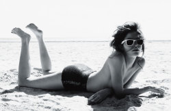 Lonneke Engel lying on the beach. I love her position on the