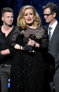 Adele accepts the award for Album of the Year at The 54th Annual