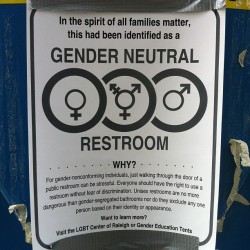genderqueer:  Sign reads: “In spirit of all families matter,