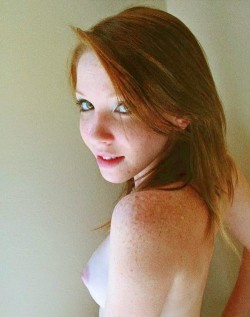 heavenlyredheads:  Pretty redhead with freckles, showing her