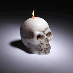 ianbrooks:  Bleeding Skull Candle I’m always interested in