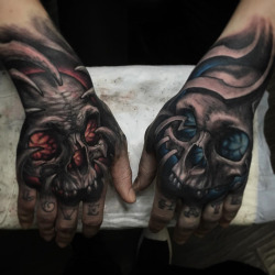 tattooideas123:  Hand Skullshttp://tattooideas247.com/hand-skulls/  Awesome ink!