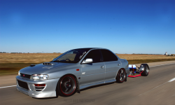 heart-condition:  this guy build a tiny trailer to pull behind his subie… and then he slammed it.