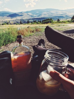 helainetieu:  A photo from our roadtrip. Kicking back with some whiskey and enjoying the view from my boyfriend’s parent’s house in Wyoming. Instagram - @HelaineRose 