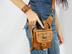 begentlewithmewatson:  satdeshret:  warriorcreek:  The Warrior Pack purse line. There are 8 different ways you can wear the purse (handbag, purse, thigh holster, shoulder holster, messenger bag, backpack, fanny pack, and protected purse). Simply adjust