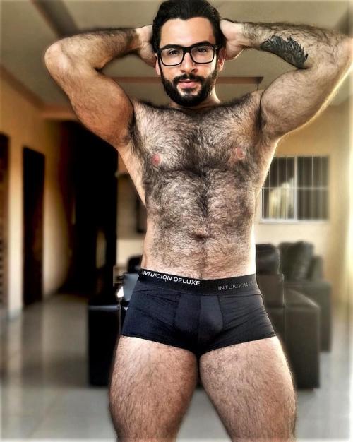 yummy1947:  beards-of-paradise:Josivan Gomes   This extremely hairy gorilla/bear is so handsome with his gorgeous black beard, moustache and eyebrows, as well as sprouting beautiful hairy shoulders that merge with his magnificent hairy chest, luscious