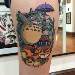 fuckyeahtattoos:  As a child I made my mom to rent My Neighbor Totoro from Blockbuster at least once a week until she finally bought me my own copy. Done by James Cumberland at Sunday Tattoo Gallery in Jacksonville, FL