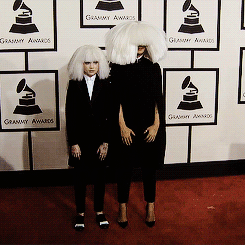 actuallyclintbarton:  batmobile:cexting:maddie and sia arrive at the grammy awardssia has severe social anxiety as well as grave’s disease (an autoimmune disease that affects one’s facial features) so why don’t we keep mocking a mentally and physically