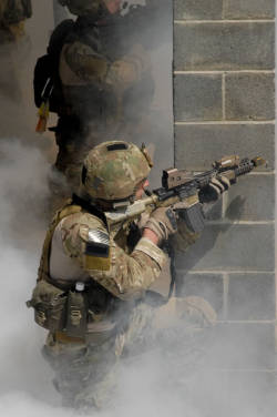 youareclearedhot-over:  FORT BRAGG, N.C. — U.S. Army Rangers from U.S. Army Special Operations Command (Airborne) conduct close-quarters battle drills at a range for CAPEX 2011 participants. A capabilities exercise, or CAPEX, demonstrates Army Special