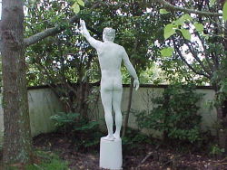 statuepainted: I’d always wanted to paint a guy as a living statue and pose him in the garden. I even went as far as getting different paints and trying them out on myself–only on a small part of my body, though, like a foot or my chest, since I was