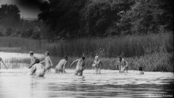 In certain parts of Germany, this is still a normal scene today  http://amp.dw.com/en/why-germanys-nudist-culture-remains-refreshing/a-43917929?__twitter_impression=true