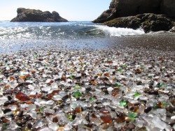 sixpenceee:    Glass Beach, CA  Glass Beach is a beach in MacKerricher State Park near Fort Bragg, California that is abundant in sea glass created from years of dumping garbage into an area of coastline near the northern part of the town.   