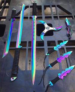 obstinate-nocturna:  sixpenceee:  You can kill people in style with these things! (Source)  Taste the rainbow motherfuckers 