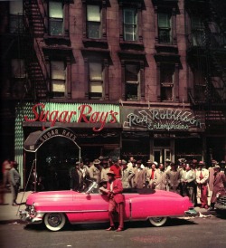 jazzyfarmer:    Sugar Ray Robinson in front of his restaurant in Harlem,  Seventh Avenue and 124th Street   , 1950. 