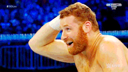 mith-gifs-wrestling: A smile and a wink from Sami Zayn.