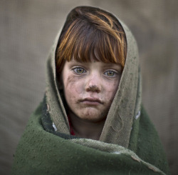 chingizhobbes:  Laiba Hazrat, age 6. Photo taken near Islamabad, on January 24, 2014. (AP Photo/Muhammed Muheisen) 