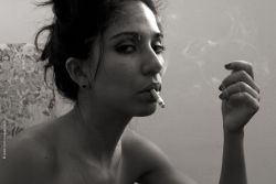 Yana smoking, by Daniel Bauer