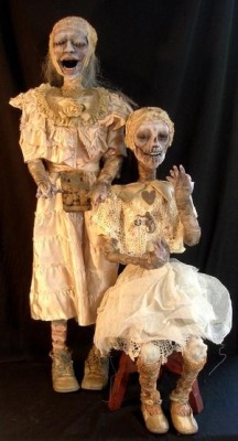 BY D.L. MARIAN&ndash;Victorian Mummy Series. Poor sisters Aurora and Venus were found in a Philadelphia attic. The girl's beauty can still be seen through the decay. 35&quot;tall. antique clothing and wrappings were used to create them.