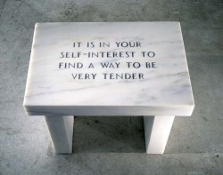 Jenny Holzer, It is in Your Self-Interest to Find a Way to Be Very Tender, White Danby marble imperial footstool, 1983-85 (Collection of Jessica and Frank Lonergan).