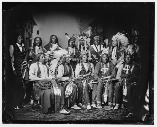 blondebrainpower:  Lakota delegation at the White House; Red Cloud and Native Americans. Standing: Red Bear (Sons Are?), Young Man Afraid of his Horse, Good Voice, Ring Thunder, Iron Crow, White Tail, Young Spotted Tail; seated: Yellow Bear, Jack Red