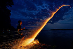 Summer night sparklers (long exposure of a bottle rocket)