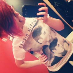 bepr:  Finally wore my #justinbieber shirt out. My hair matches the #target #fittingroom Shopping for work shirts doeee. #bieberfever #belieber
