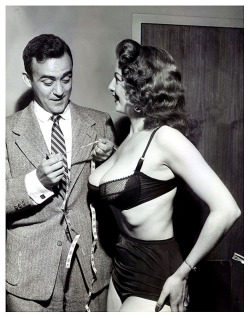  TEMPEST Insures Body For A MILLION DOLLARS! Vintage press photo from December of 1954 features Hollywood UPI correspondent Vernon Scott admiring the &ldquo;Tale Of The Tape&rdquo; re: the dynamic proportions of Tempest.. Her measurements were recorded