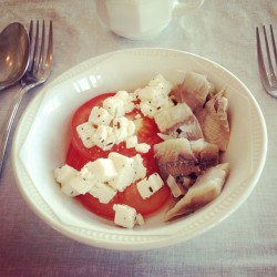 Traditional #Iceland #breakfast fare: tomato slices covered in olive oil soaked feta cheese and pickled herring. (at Hótel Örk)