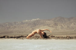 Wonderful Backbend! Photo by Dan of Cacia Zoo mimicing mountains in the middle of Death Valley. Lowest elevation in North America. April 2014