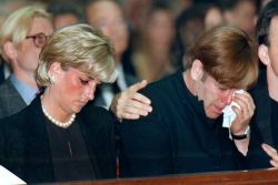  Princess Diana and Elton John at the funeral of their friend, Gianni Versace, in July of 1997. After a falling out Diana refused to speak to Elton John. According to him it was at the funeral where they patched things up. She had come alone and gone
