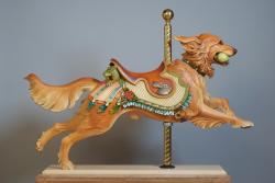 purpletabby:  Amazing carousel dogs by Tim Racer.  http://www.timracer.com/ Like the carousel carvers of 100 years past, Tim uses basswood and wooden dowels instead of nails that would one day rust. 